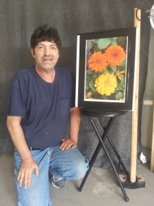 Artist with painting
